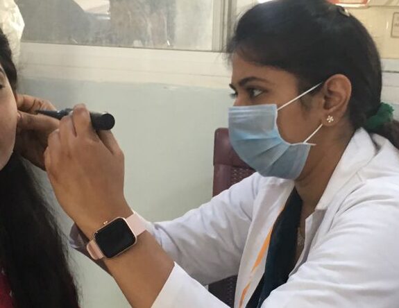 Dr Salma ENT examining a patient